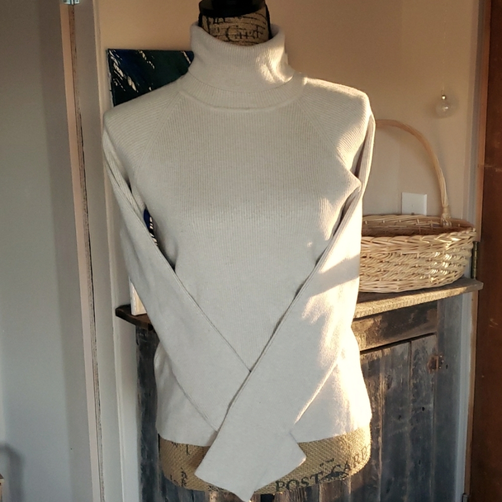 NWOT Maurice's size large creamy tan turtleneck.